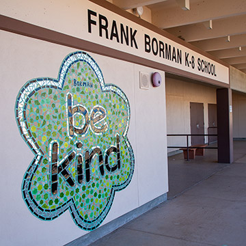 Be Kind Mural at the entrance to school